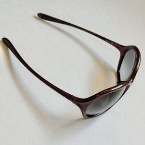 Oakley Women’s Sunglasses - Warm Up Like New! Color is Cosmo (Dark Burgundy)